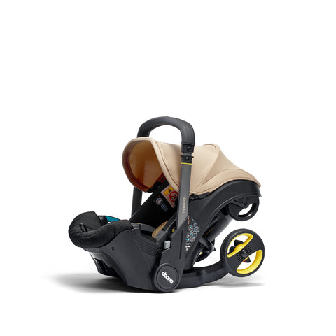 Doona vagn + bilbarnstol i Sahara Sand