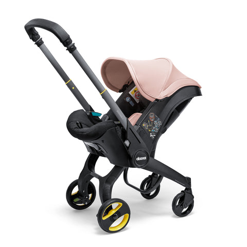 Doona vagn + bilbarnstol  i "Blush Pink"