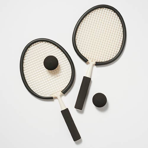 Svarta vintage strandracketar i skum från Casa