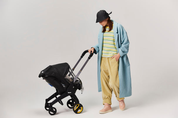 Doona i babyskydd  i "Nitro Black"