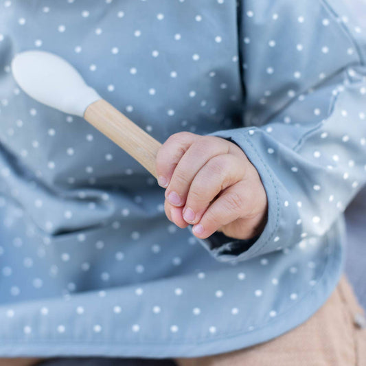 Ekologisk babyhaklapp med ärmar Tradewinds Dotty