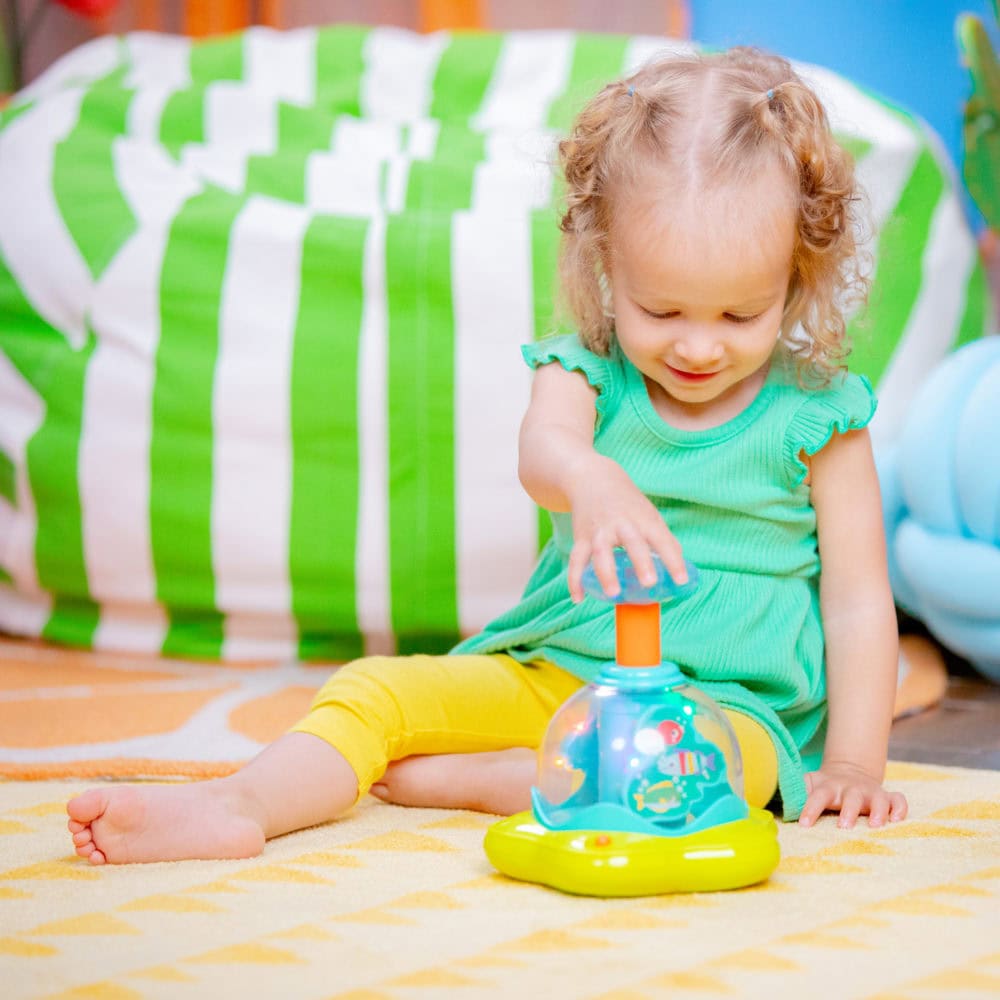 Bright Starts Press and Glow Spinner